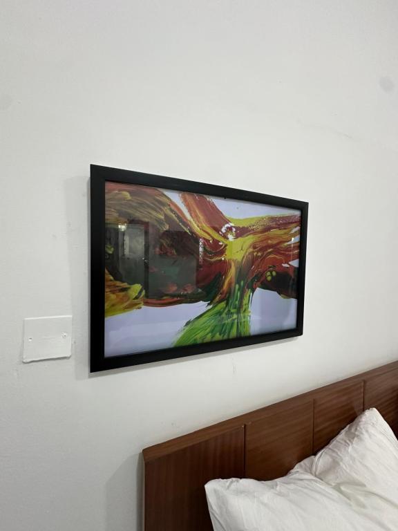 Ένα ή περισσότερα κρεβάτια σε δωμάτιο στο Jaeltravelsandairbnb