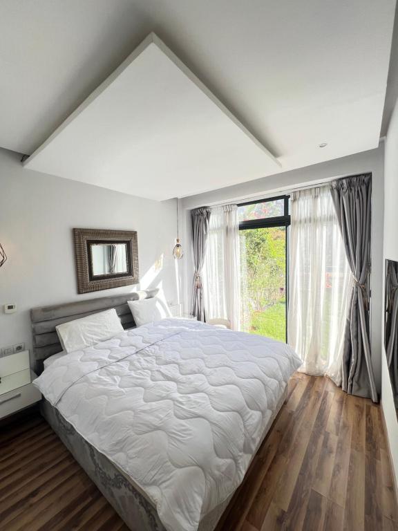 Voodi või voodid majutusasutuse Pearl Rabat Garden Stay toas