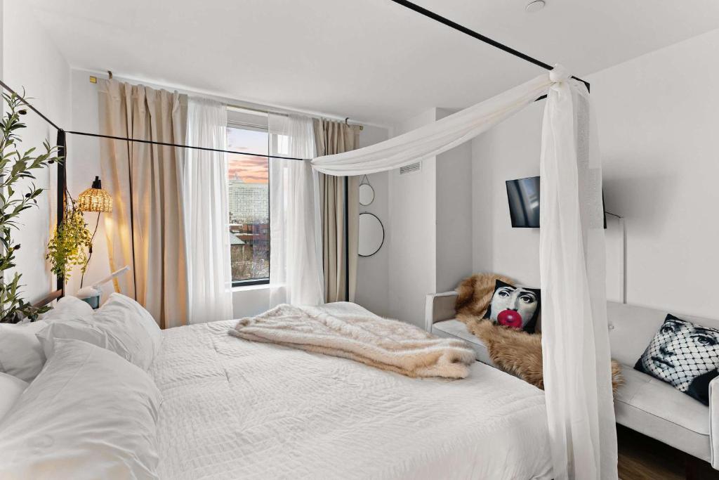 En eller flere senge i et værelse på South End Escape Your Family's Dream Getaway