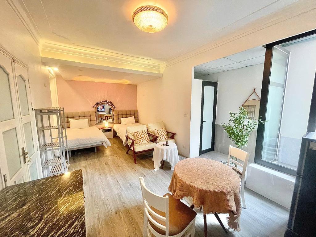 Ένα ή περισσότερα κρεβάτια σε δωμάτιο στο CHARM CHARM - kimmy housing - 48 To Ngoc Van