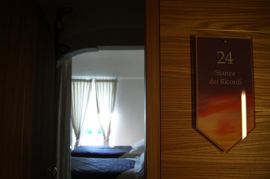 Postel nebo postele na pokoji v ubytování Dimora Intini