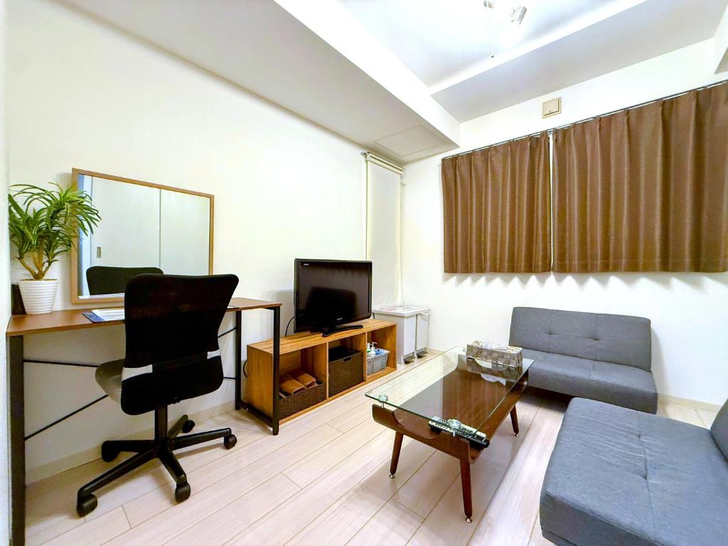 TV a/nebo společenská místnost v ubytování Excel 平岸A -FIX HOME-