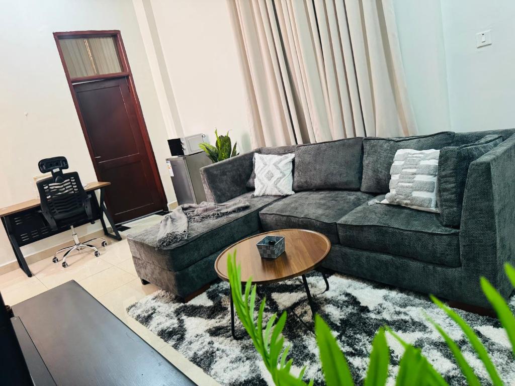 Posezení v ubytování Eka Haven, Apartment in Dar es salaam