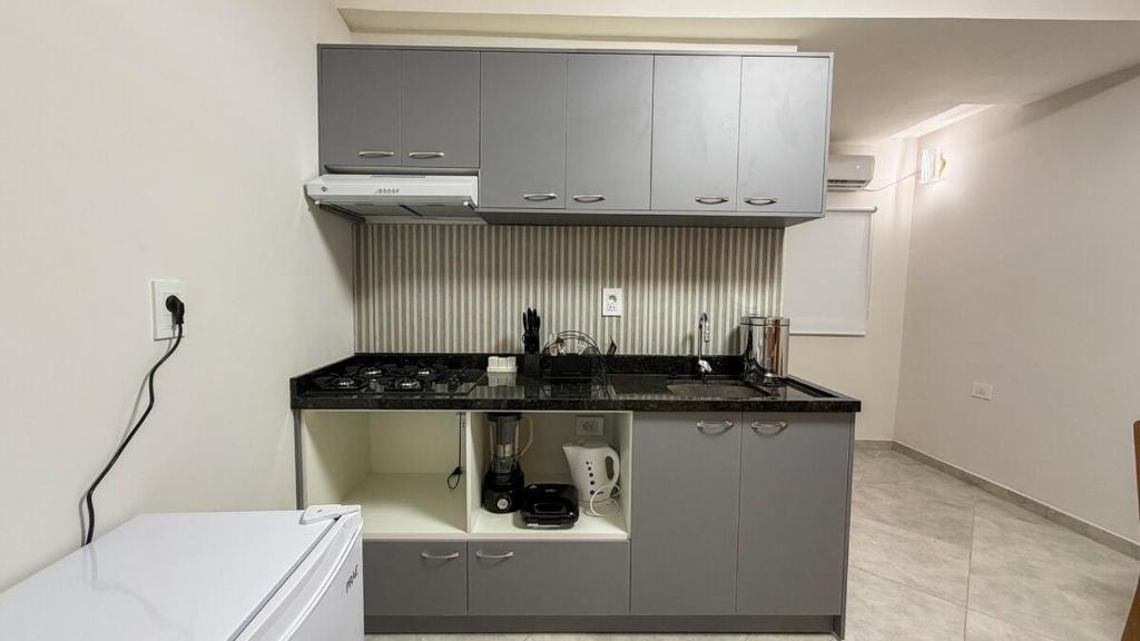 Kuchyň nebo kuchyňský kout v ubytování Oasis Urbano