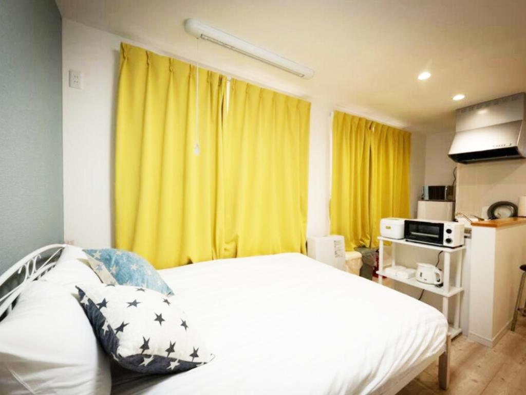 Η κουζίνα ή μικρή κουζίνα στο （B5）アクセス良好！快適2名まで滞在可☆サービスアパ―トメントSAPPORO南8条B5