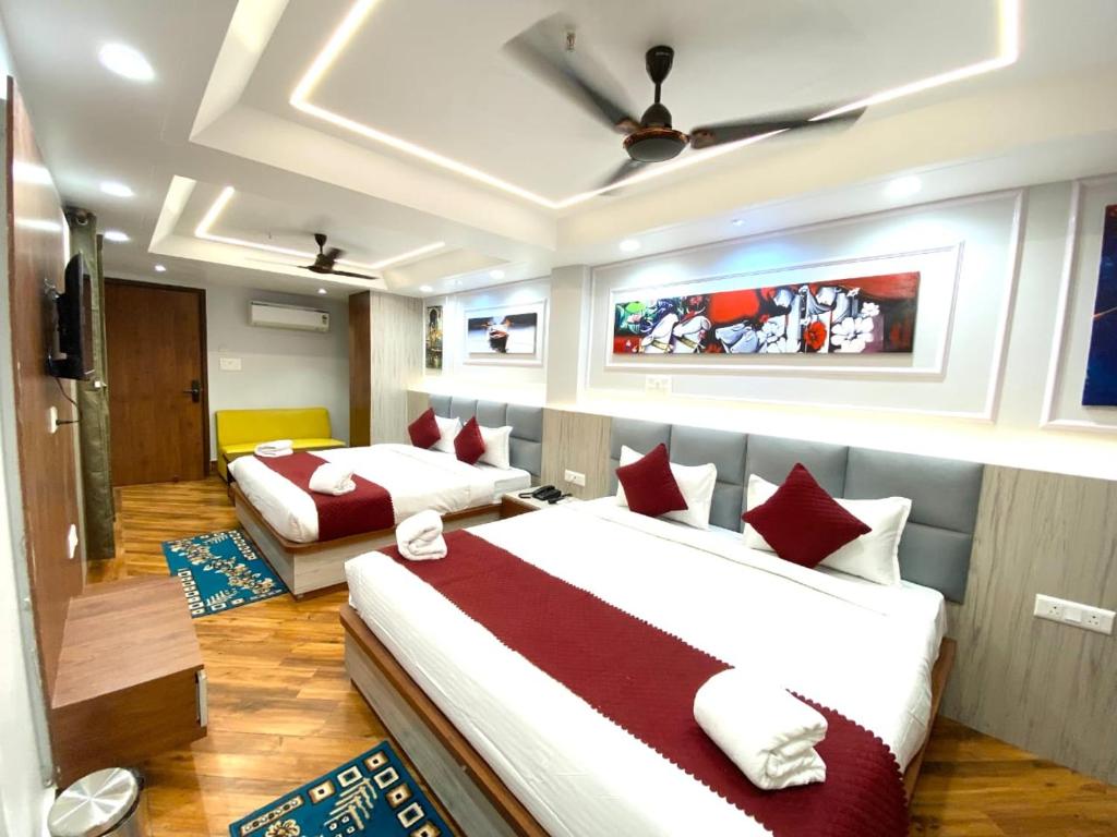 Ένα ή περισσότερα κρεβάτια σε δωμάτιο στο Shree Shanteshwar Mahadev Inn