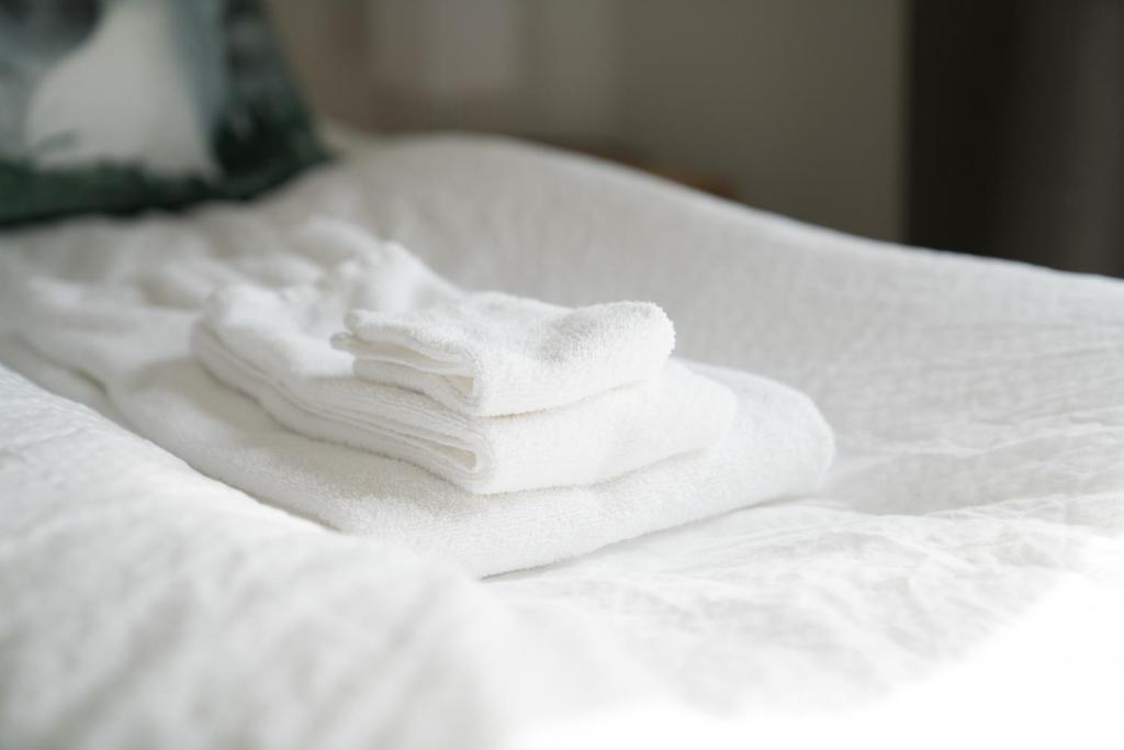 Postel nebo postele na pokoji v ubytování Hotel West
