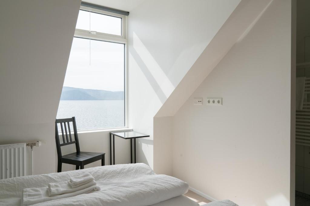 Postel nebo postele na pokoji v ubytování Hotel West
