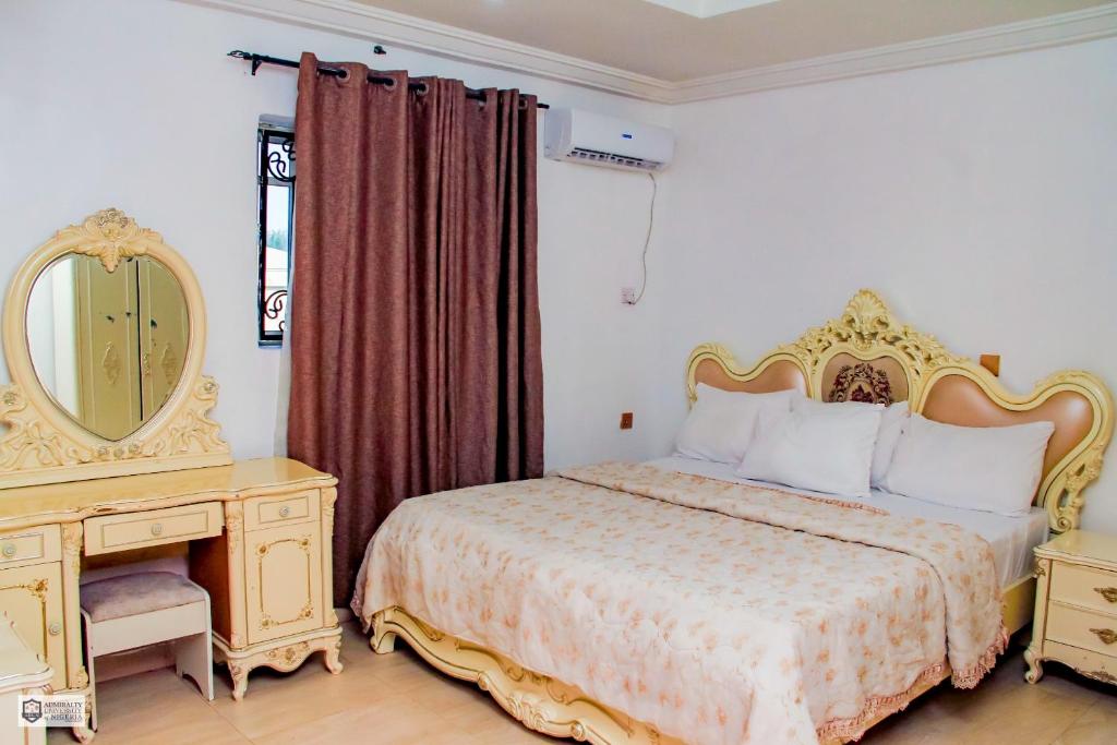 Ένα ή περισσότερα κρεβάτια σε δωμάτιο στο Fudan International Hotel and Resort