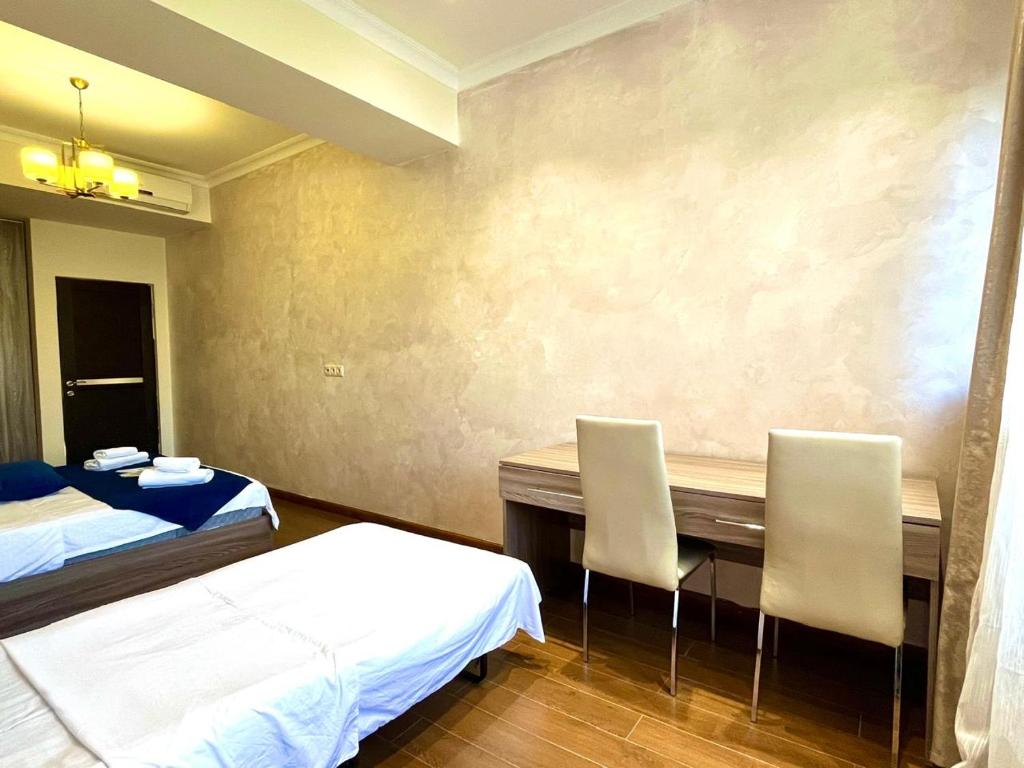 Ένα ή περισσότερα κρεβάτια σε δωμάτιο στο Mandarin apartments