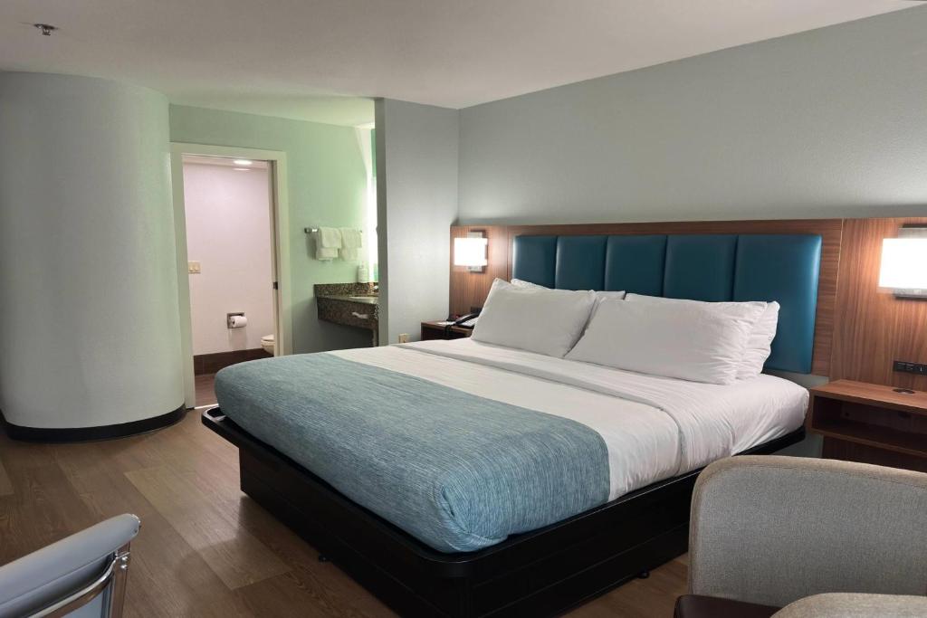 Ένα ή περισσότερα κρεβάτια σε δωμάτιο στο Wingate by Wyndham Macon West I-475