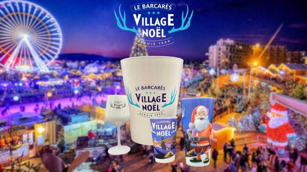 a picture of a carnival with a ferris wheel at T2 Cosy avec jardin Barcares Village in Le Barcarès