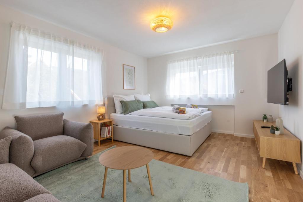 Ένα ή περισσότερα κρεβάτια σε δωμάτιο στο Waldnest Apartment - Wohnung - Schwarzwald