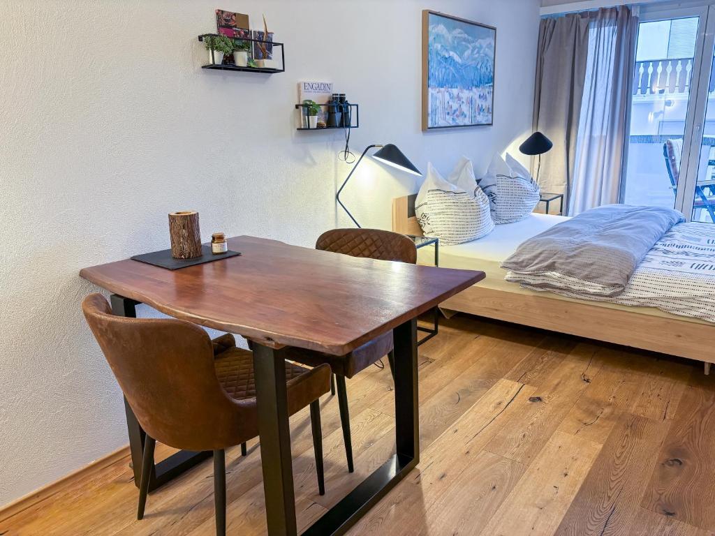 Postel nebo postele na pokoji v ubytování swissme - modernes Studio am Sportplatz mit Balkon & Parkplatz