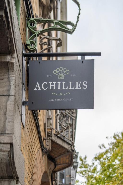 a sign on the side of a building at B&B Achilles in Ghent