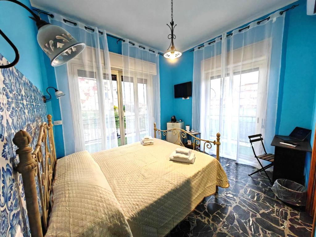 Postel nebo postele na pokoji v ubytování B&B Amàre