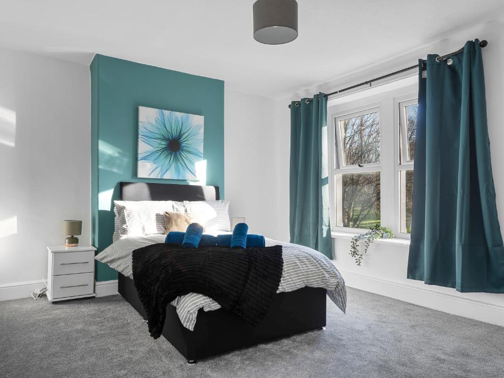 Ένα ή περισσότερα κρεβάτια σε δωμάτιο στο Harrington Haven - 4bed Home Workington