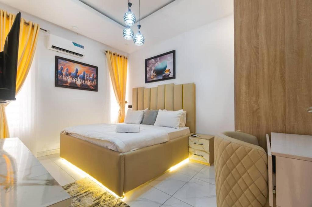 Ένα ή περισσότερα κρεβάτια σε δωμάτιο στο Emoj cluster concept limited