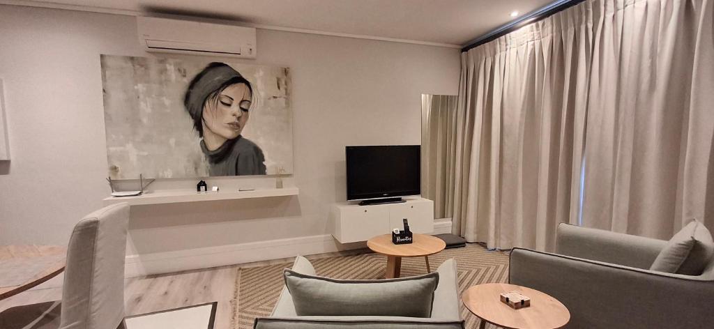 TV a/nebo společenská místnost v ubytování The Gallery on Gray