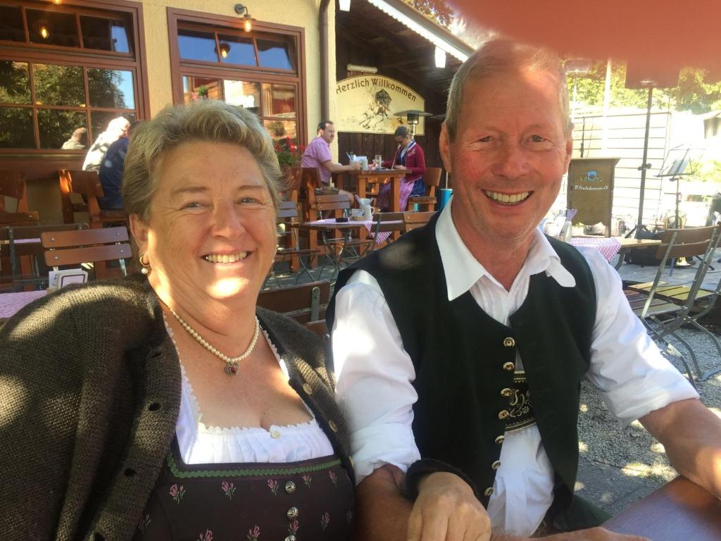 a man and a woman posing for a picture at Haus Hinterseer in Schneizlreuth