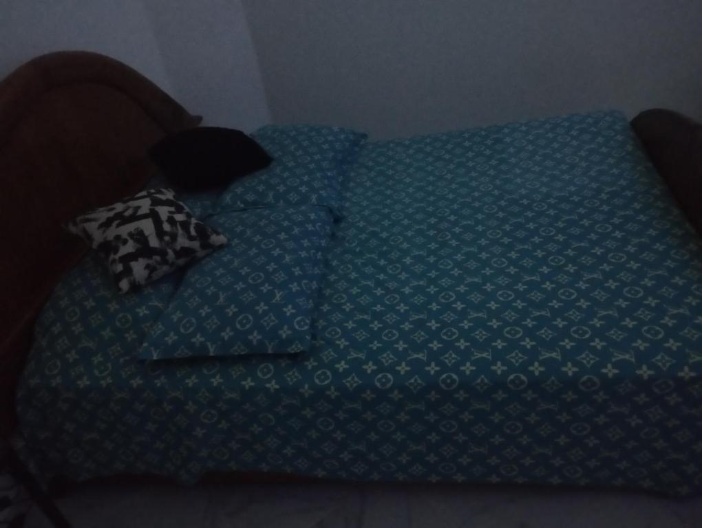 Ένα ή περισσότερα κρεβάτια σε δωμάτιο στο Super appartement quartier paisible proches toutes commodités