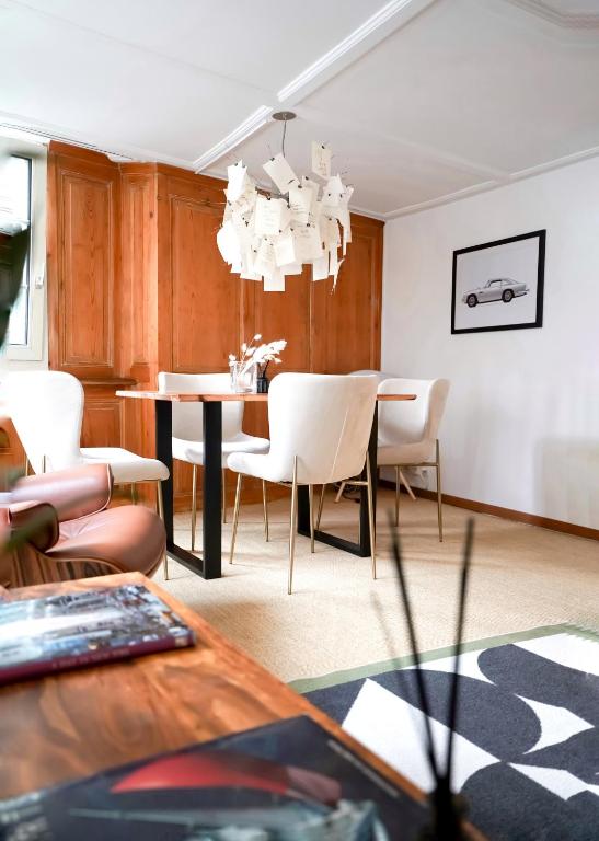 a dining room with a table and chairs at Charming Historical Apartment in Zurich City Center Oldtown in Zurich