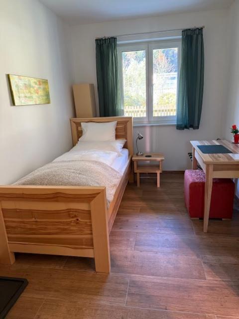 Ένα ή περισσότερα κρεβάτια σε δωμάτιο στο Gesäuse Zimmer