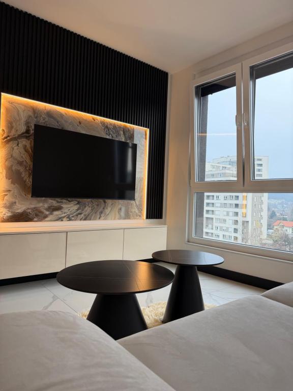 Ένα ή περισσότερα κρεβάτια σε δωμάτιο στο Avenija-Otoka