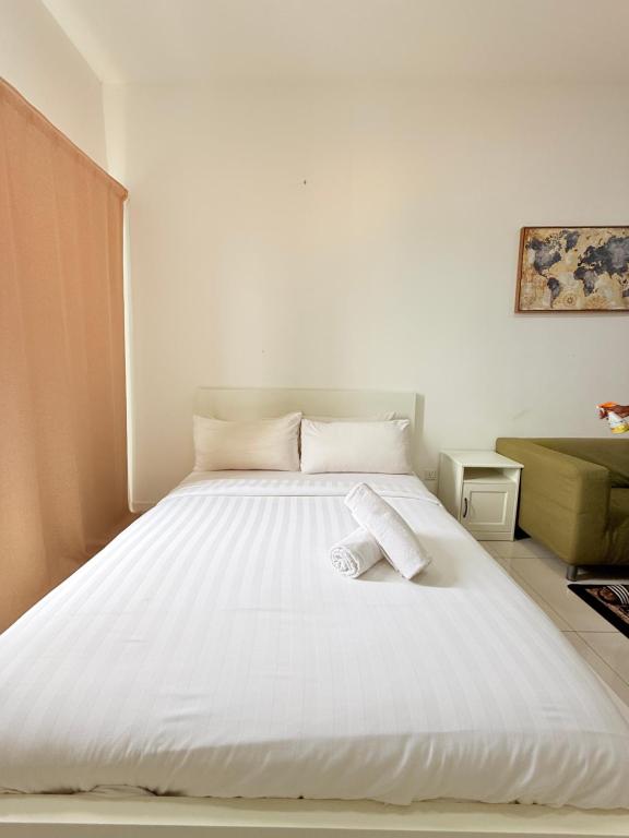 Ένα ή περισσότερα κρεβάτια σε δωμάτιο στο Chambers Suites By FSB