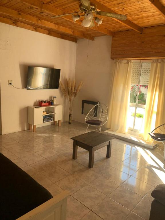 TV a/nebo společenská místnost v ubytování Casa Mirta Frente