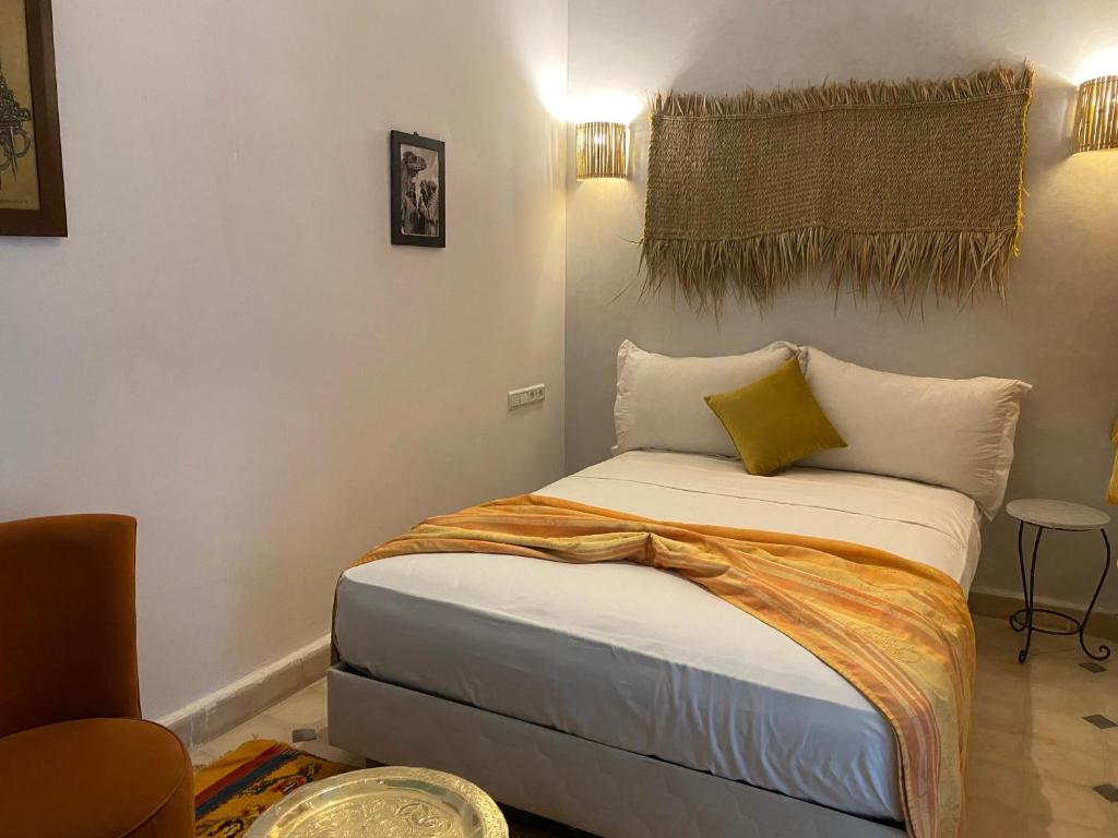 Postel nebo postele na pokoji v ubytování Riad Deux Palmiers