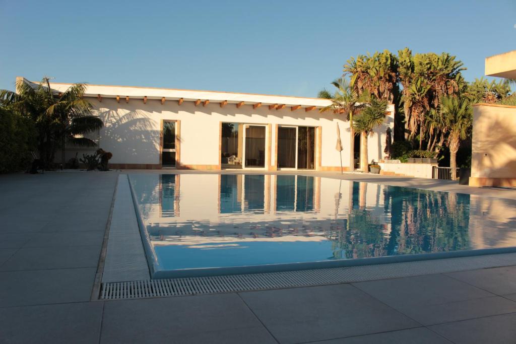 Bazén v ubytování Villetta di Nonna Giovanna nebo v jeho okolí