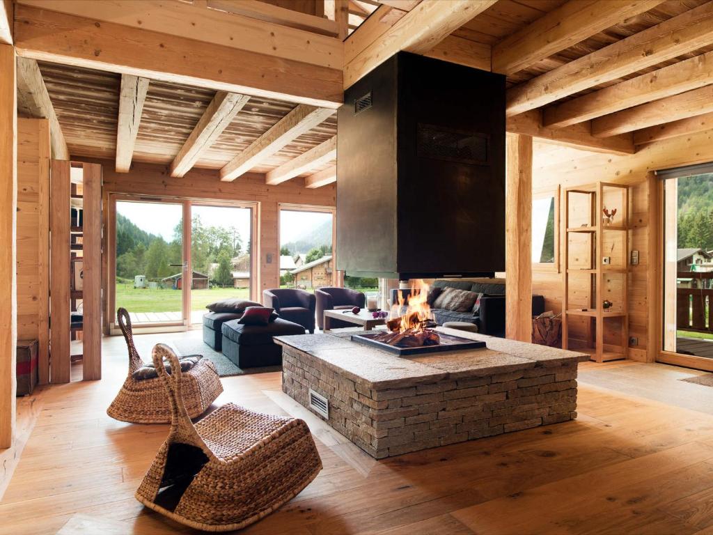 Гостиная зона в Chalet d'exception à Chamonix avec sauna, cheminée et proximité des pistes skiables - FR-1-343-181