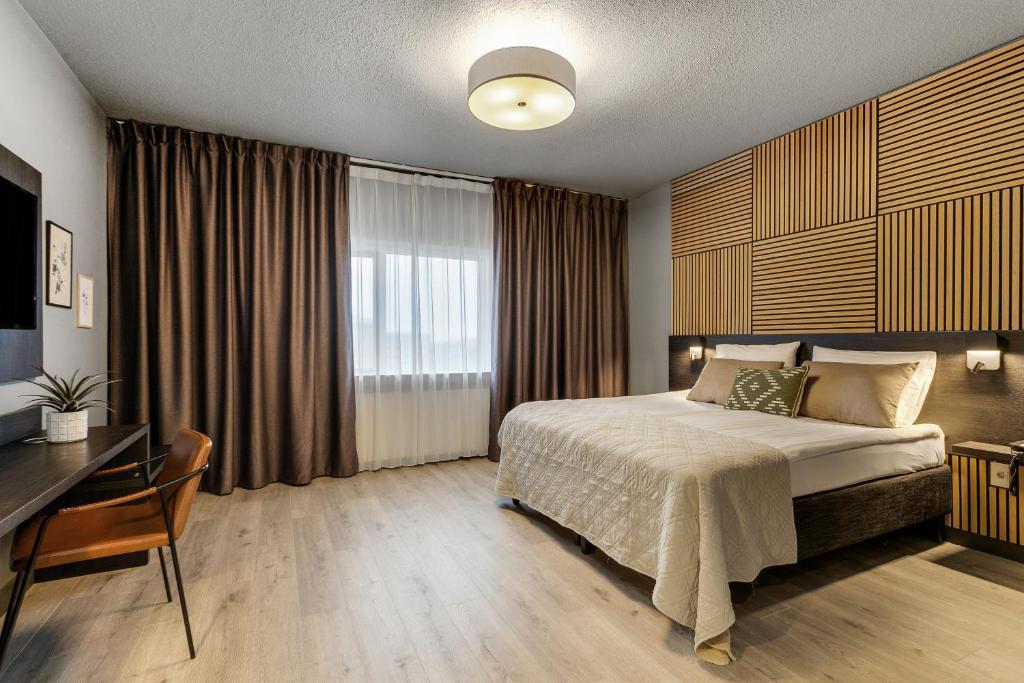 Postel nebo postele na pokoji v ubytování Konvin Hotel by Reykjavik Keflavik Airport