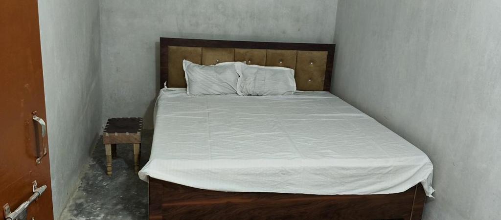 Postel nebo postele na pokoji v ubytování SK HOTEL & Restaurant