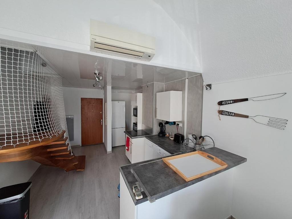 Køkken eller tekøkken på Spacieux duplex sur le port