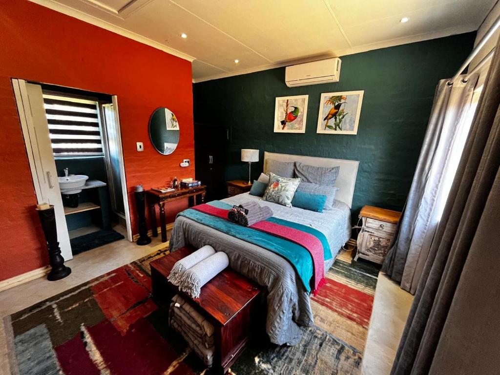 Ένα ή περισσότερα κρεβάτια σε δωμάτιο στο Clarkys Bucketlist Dullstroom