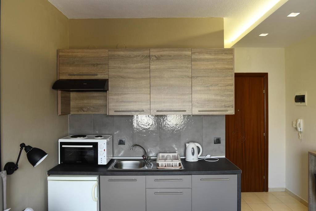 Kuchnia lub aneks kuchenny w obiekcie 4 Seasons Luxury Apartments