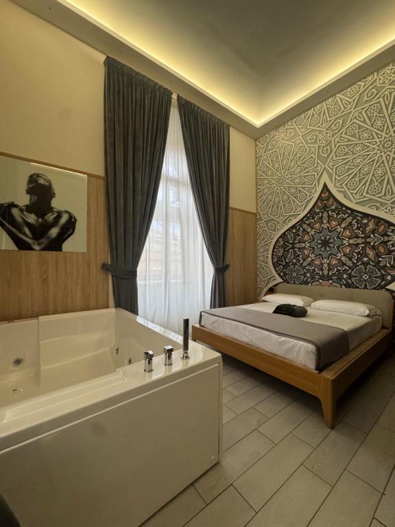 Cama o camas de una habitación en Kore Luxury Suite e Spa