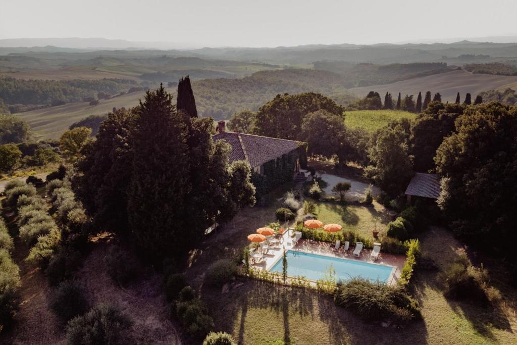 an aerial view of a estate with a swimming pool at Fattoria del Colle in Trequanda
