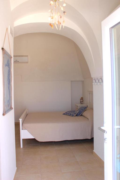 Postel nebo postele na pokoji v ubytování Il Principe del mare B&B
