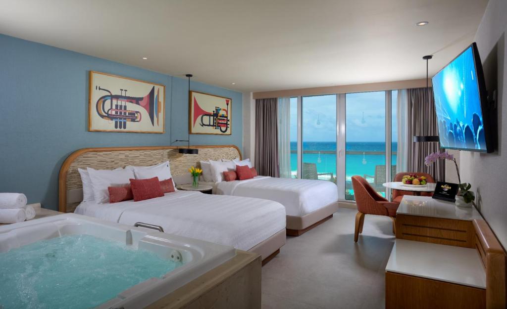 Cama o camas de una habitación en Hard Rock Hotel Cancun - All Inclusive