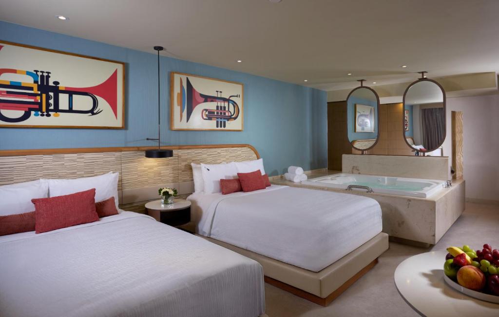 Cama o camas de una habitación en Hard Rock Hotel Cancun - All Inclusive