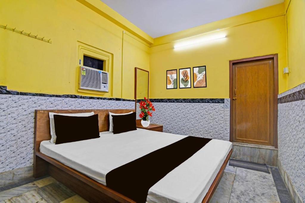 Ένα ή περισσότερα κρεβάτια σε δωμάτιο στο Hotel O Down Town Hotel