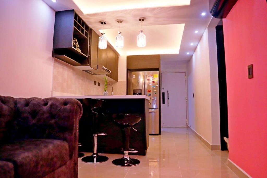 Televiisor ja/või meelelahutuskeskus majutusasutuses Apartamento VIP cómodo - Piso 12
