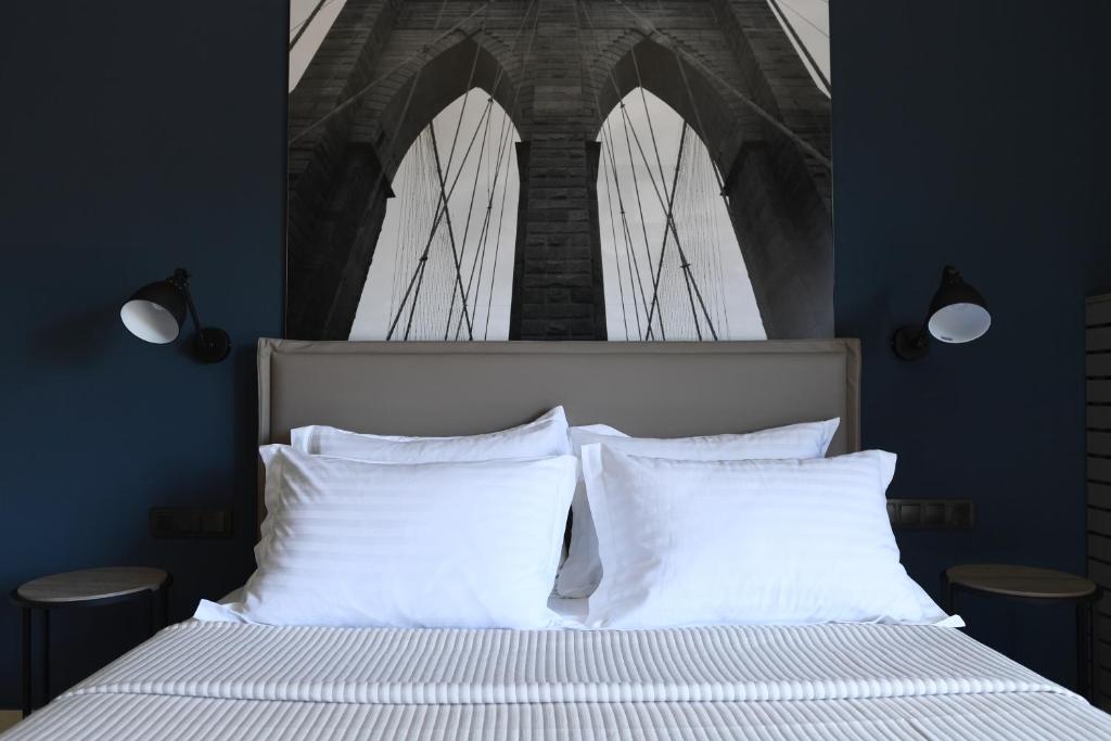Łóżko lub łóżka w pokoju w obiekcie 4 Seasons Luxury Apartments