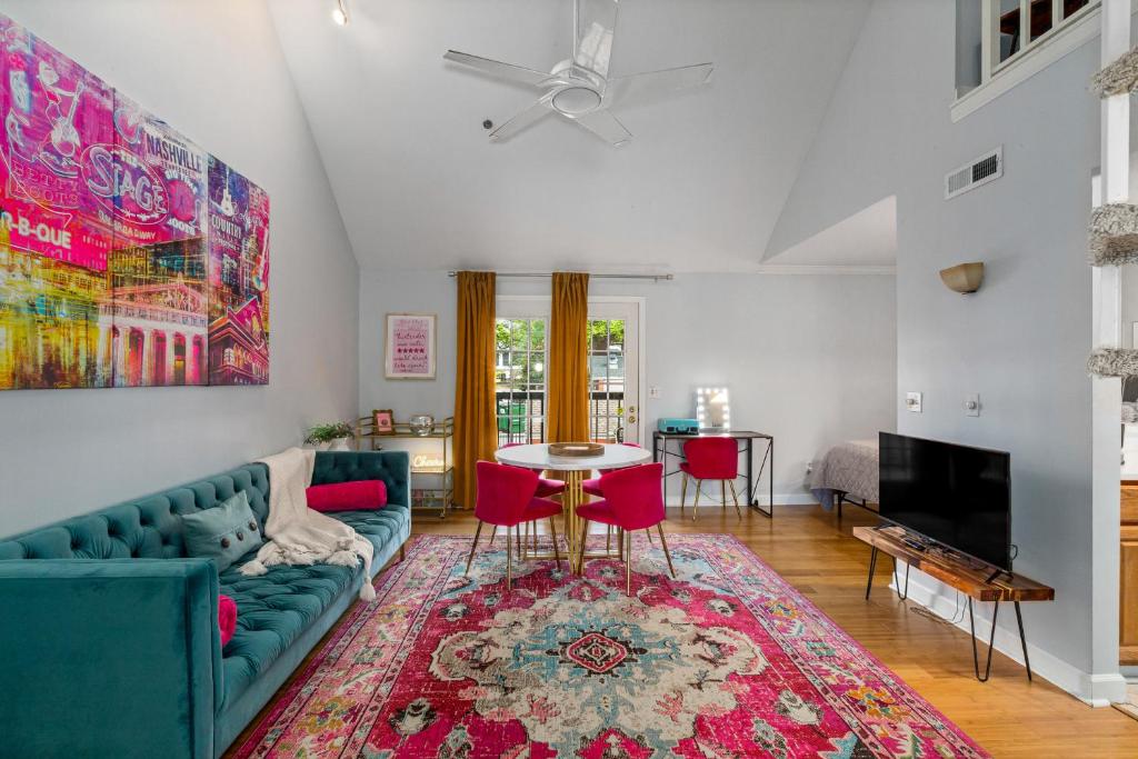 a living room with a couch and a table at The Fancy Nancy in Nashville