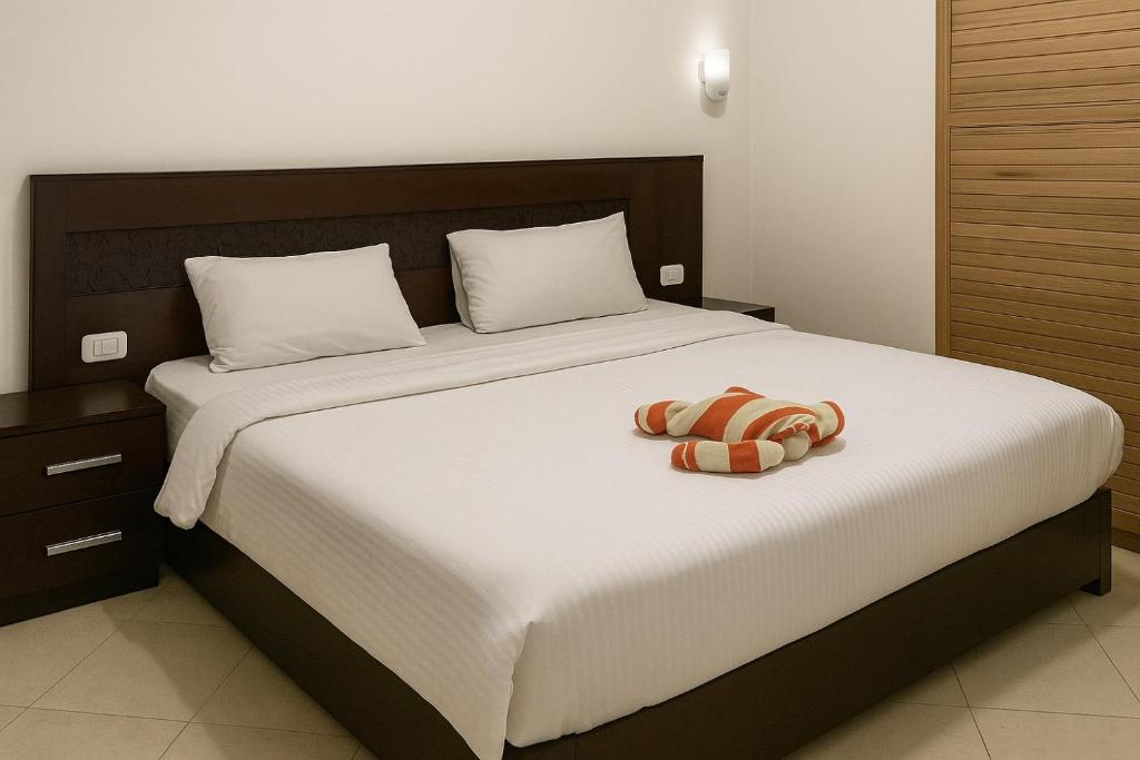 Voodi või voodid majutusasutuse One-Bedroom Chalet with Side Sea View , Turtles Beach C23 toas