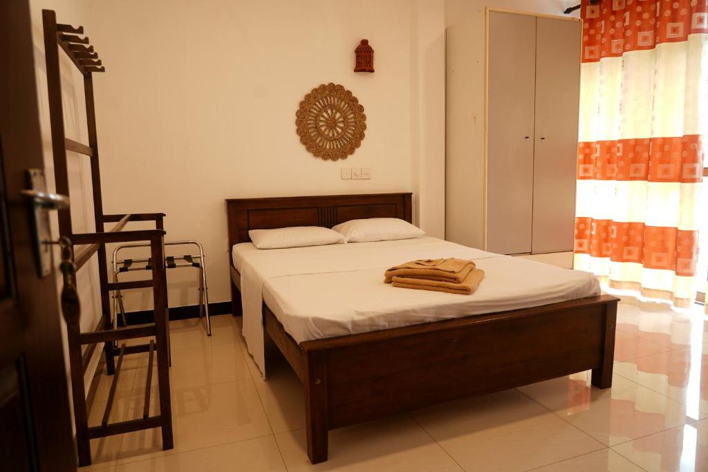 Ένα ή περισσότερα κρεβάτια σε δωμάτιο στο Three Elements