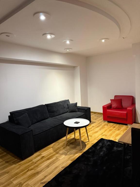 Posezení v ubytování Dwupokojowy Apartament przy Piotrkowskiej